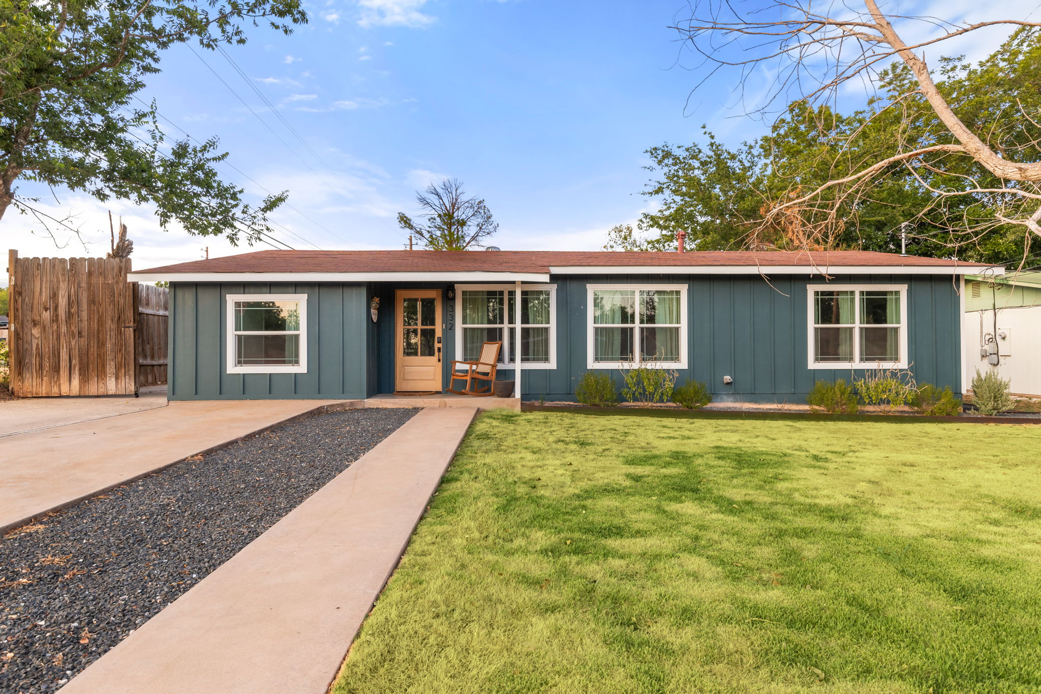 Mulberry House front exterior with green lawn