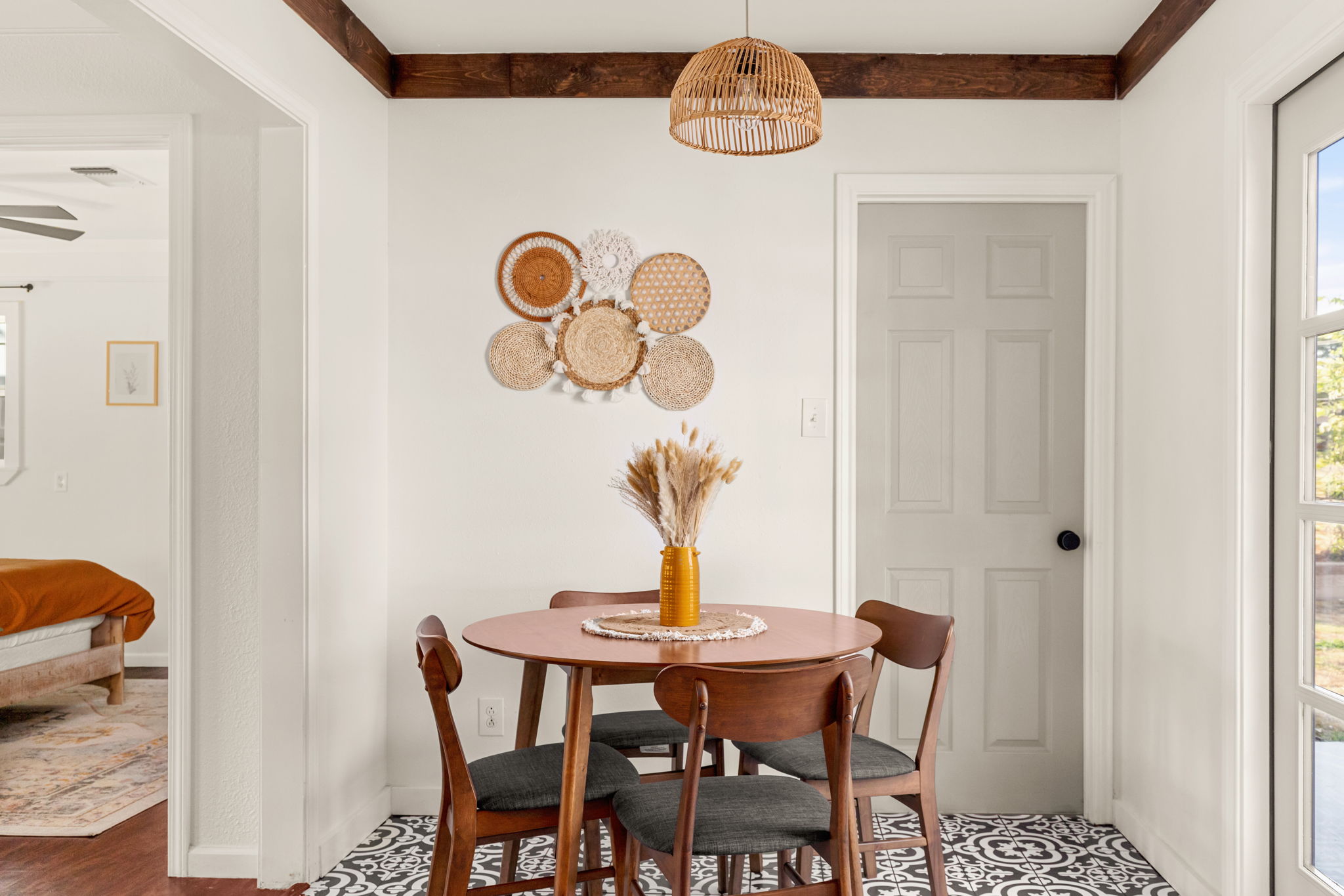 Dining nook with rattan pendant light