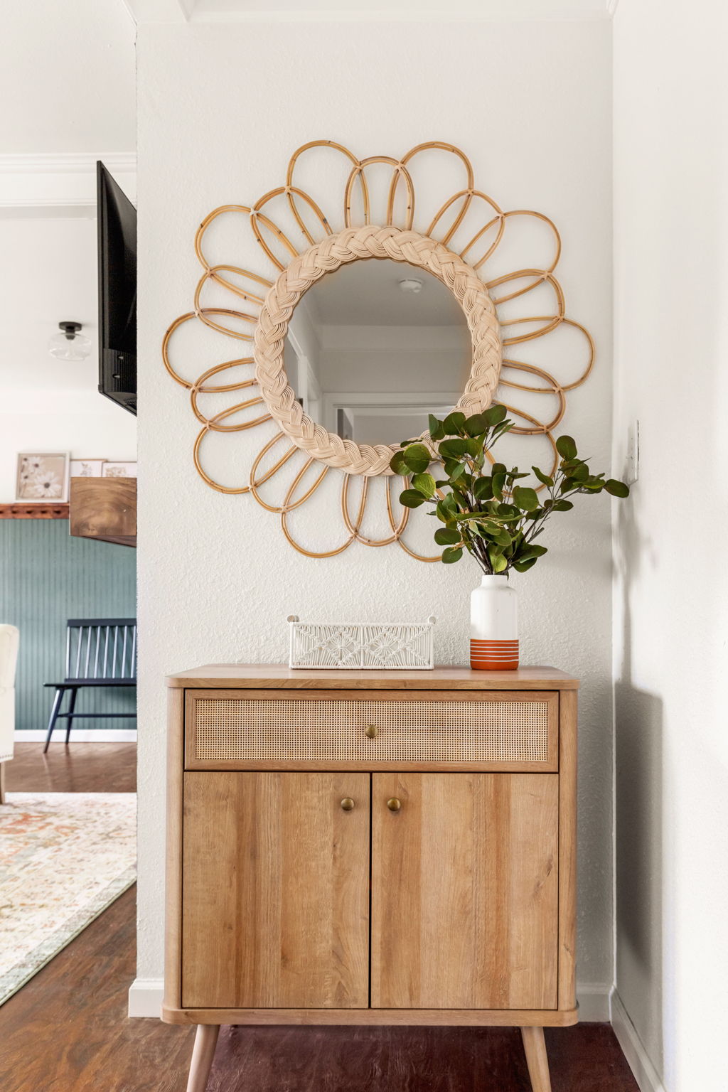 Boho entry with rattan sunflower mirror